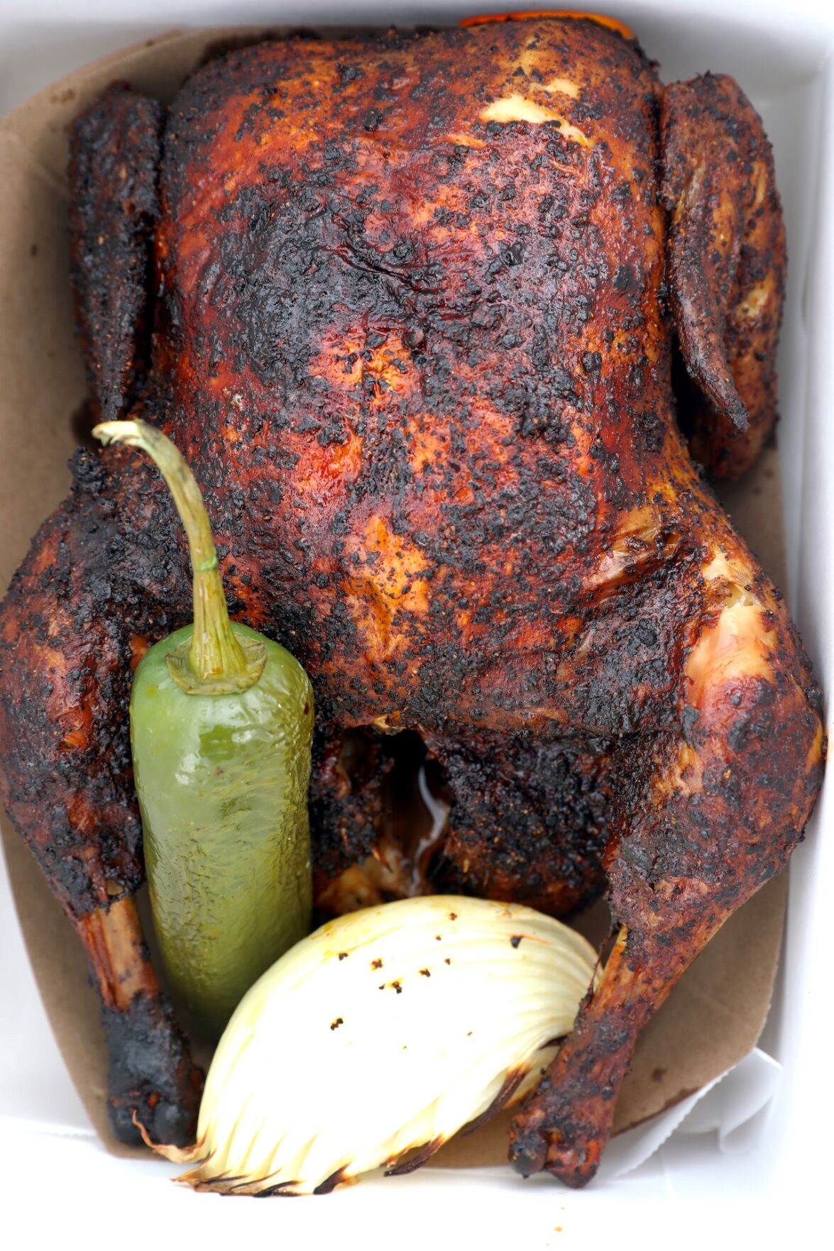 Whole Mexican-style chickens at The Queso Shop.